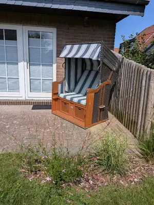 Ein Garten an der Unterkunft Ferienwohnung Deichkate - Auszeit an der Nordsee