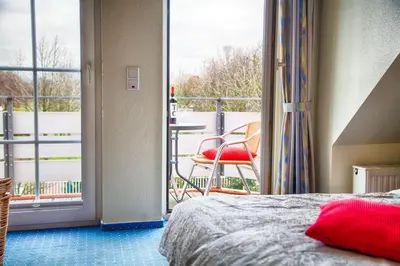 Ein Bett oder Betten in einem Zimmer der Unterkunft Elbstrom, Ferienwohnung 21