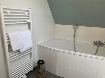 Ein Badezimmer in der Unterkunft Nige Ooge FeWo 6