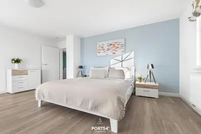 Ein Bett oder Betten in einem Zimmer der Unterkunft Ferienhaus Buhne 23