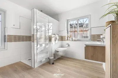 Ein Badezimmer in der Unterkunft Ferienhaus Buhne 23