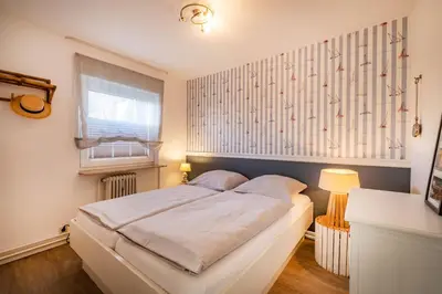Ein Bett oder Betten in einem Zimmer der Unterkunft Haus Alleestraße Apartment 1