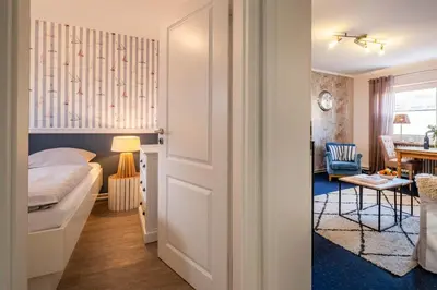 Ein Bett oder Betten in einem Zimmer der Unterkunft Haus Alleestraße Apartment 1