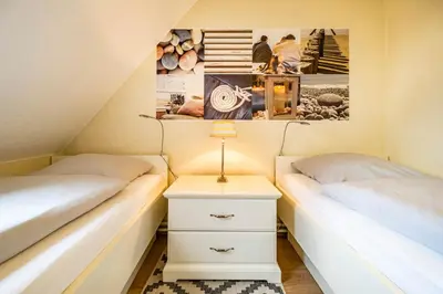 Ein Bett oder Betten in einem Zimmer der Unterkunft Haus Alleestraße Apartment 2