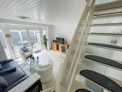 Ein Sitzbereich in der Unterkunft Ferienhaus Am Ringwall 36