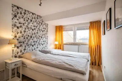 Ein Bett oder Betten in einem Zimmer der Unterkunft Haus Alleestraße Apartment 3