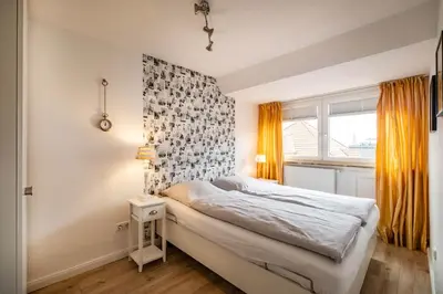Ein Bett oder Betten in einem Zimmer der Unterkunft Haus Alleestraße Apartment 3