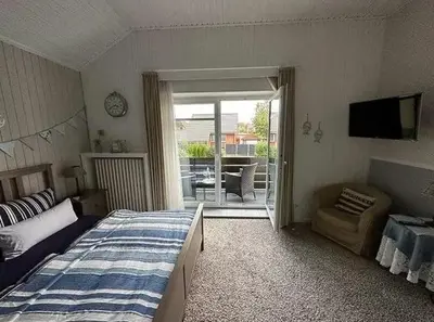 Ein Bett oder Betten in einem Zimmer der Unterkunft Pfötchenparadies I