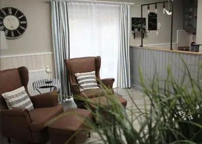 Ein Sitzbereich in der Unterkunft Pfötchenparadies II