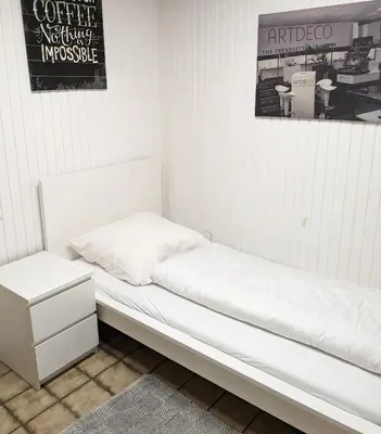 Ein Bett oder Betten in einem Zimmer der Unterkunft Monteurwohnung bei Covestro & Yara