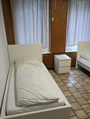 Ein Bett oder Betten in einem Zimmer der Unterkunft Monteurwohnung Brunsbüttel Südseite