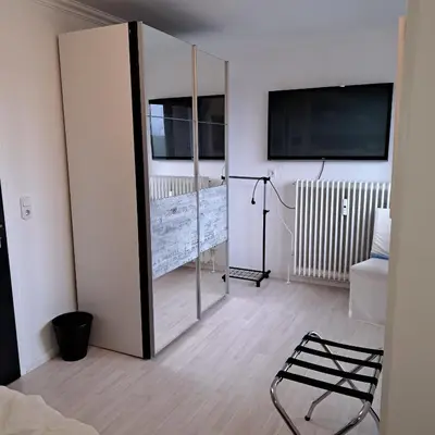 Ein Bett oder Betten in einem Zimmer der Unterkunft Perlebucht-Oase