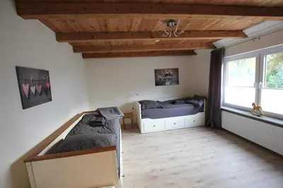 Ein Bett oder Betten in einem Zimmer der Unterkunft Ferienhaus Weideblick