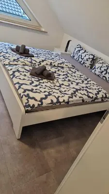 Ein Bett oder Betten in einem Zimmer der Unterkunft Strandnahe Ferienwohnung Nordsee Oase Whg 1