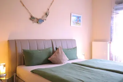 Ein Bett oder Betten in einem Zimmer der Unterkunft Villa am Meer - Antje