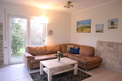 Ein Sitzbereich in der Unterkunft Villa am Meer - Antje