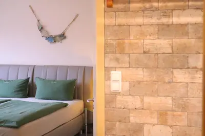 Ein Bett oder Betten in einem Zimmer der Unterkunft Villa am Meer - Antje
