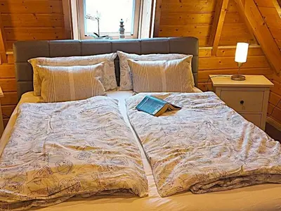 Ein Bett oder Betten in einem Zimmer der Unterkunft Weitblick - b70565
