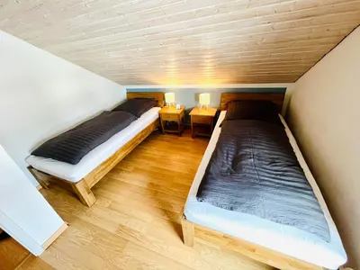 Ein Bett oder Betten in einem Zimmer der Unterkunft Lüttje Deichvilla Backbord