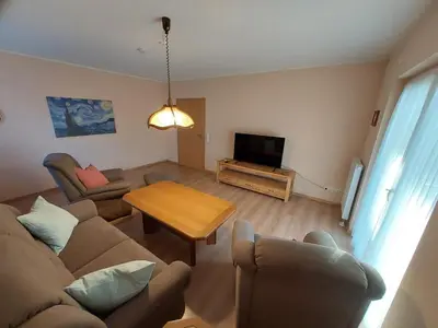 Ein Sitzbereich in der Unterkunft Ferienhaus Auenland