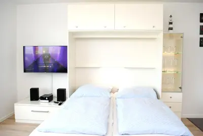 Ein Bett oder Betten in einem Zimmer der Unterkunft Hanseatic 502