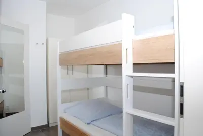 Ein Bett oder Betten in einem Zimmer der Unterkunft Hanseatic 502