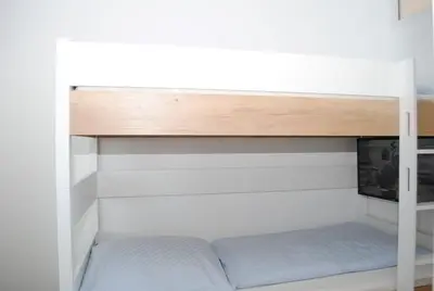 Ein Bett oder Betten in einem Zimmer der Unterkunft Hanseatic 602