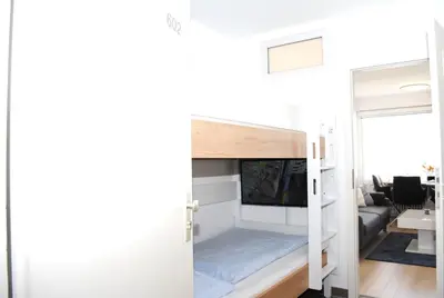 Ein Bett oder Betten in einem Zimmer der Unterkunft Hanseatic 602