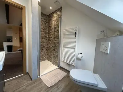 Ein Badezimmer in der Unterkunft Ferienhof am Meer
