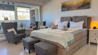 Ein Bett oder Betten in einem Zimmer der Unterkunft Meehrblick Alte Liebe