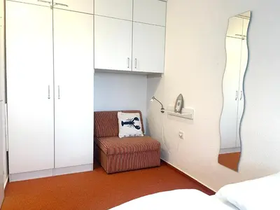 Ein Bett oder Betten in einem Zimmer der Unterkunft Frische Brise FeWo 03 09