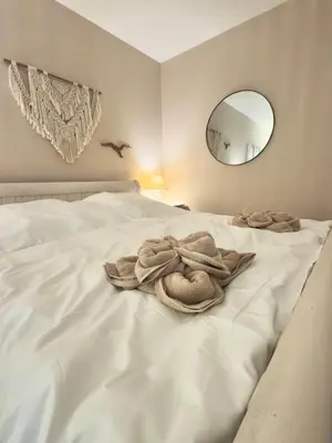 Ein Bett oder Betten in einem Zimmer der Unterkunft Duhnerherz Bestlage im Zentrum,am Strand Duhnen, Balkon mit Meerblick,Wlan Parkplatz und Fahrradabstellraum Bettwäsche und Handtücher inkl
