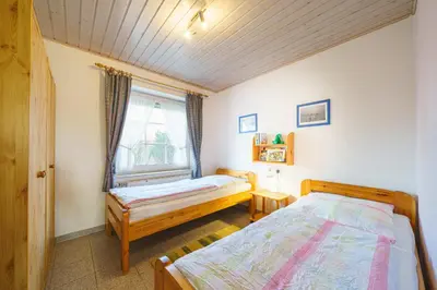 Ein Bett oder Betten in einem Zimmer der Unterkunft Am Priel 20 EG