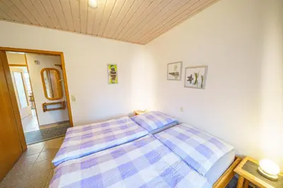 Ein Bett oder Betten in einem Zimmer der Unterkunft Am Priel 20 EG