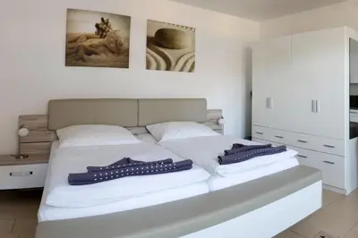 Ein Bett oder Betten in einem Zimmer der Unterkunft Seezauber HdK 68