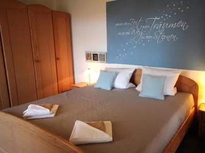 Ein Bett oder Betten in einem Zimmer der Unterkunft Residenz Trafalgar - Ferien-Apartments