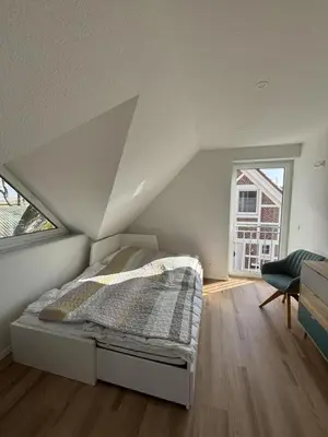 Ein Bett oder Betten in einem Zimmer der Unterkunft Ferienhaus im Angerdorf