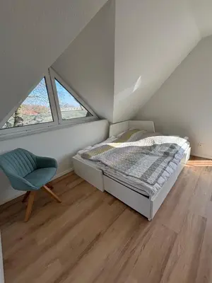Ein Bett oder Betten in einem Zimmer der Unterkunft Ferienhaus Angerdorf Nr 21