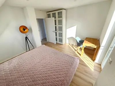 Ein Bett oder Betten in einem Zimmer der Unterkunft Ferienhaus Angerdorf Nr 21