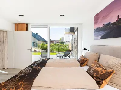 Ein Bett oder Betten in einem Zimmer der Unterkunft Inseltörn Wohnung 1