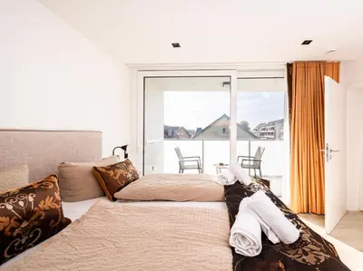 Ein Bett oder Betten in einem Zimmer der Unterkunft Inseltörn Wohnung 6