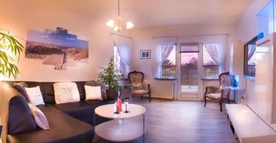 Ein Sitzbereich in der Unterkunft Ferienwohnung Gooß