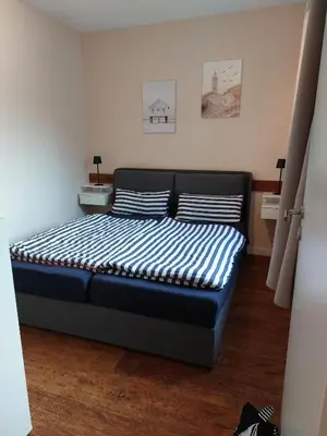 Ein Bett oder Betten in einem Zimmer der Unterkunft Haus Köhler Wohnung 1