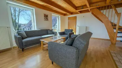 Ein Sitzbereich in der Unterkunft Kamps Schillingshof 3