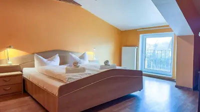 Ein Bett oder Betten in einem Zimmer der Unterkunft Kamps Schillingshof 3