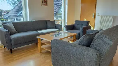 Ein Sitzbereich in der Unterkunft Kamps Schillingshof 3