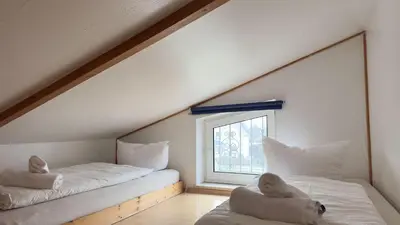 Ein Bett oder Betten in einem Zimmer der Unterkunft Kamps Schillingshof 3