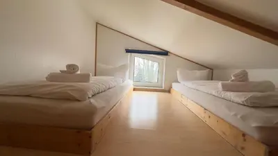 Ein Bett oder Betten in einem Zimmer der Unterkunft Kamps Schillingshof 2