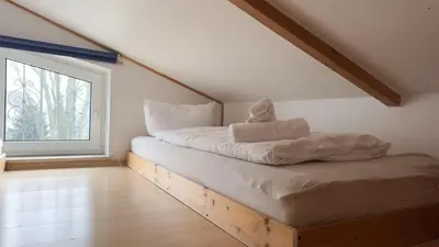 Ein Bett oder Betten in einem Zimmer der Unterkunft Kamps Schillingshof 2