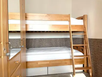 Ein Bett oder Betten in einem Zimmer der Unterkunft Frische Brise FeWo 01.04
